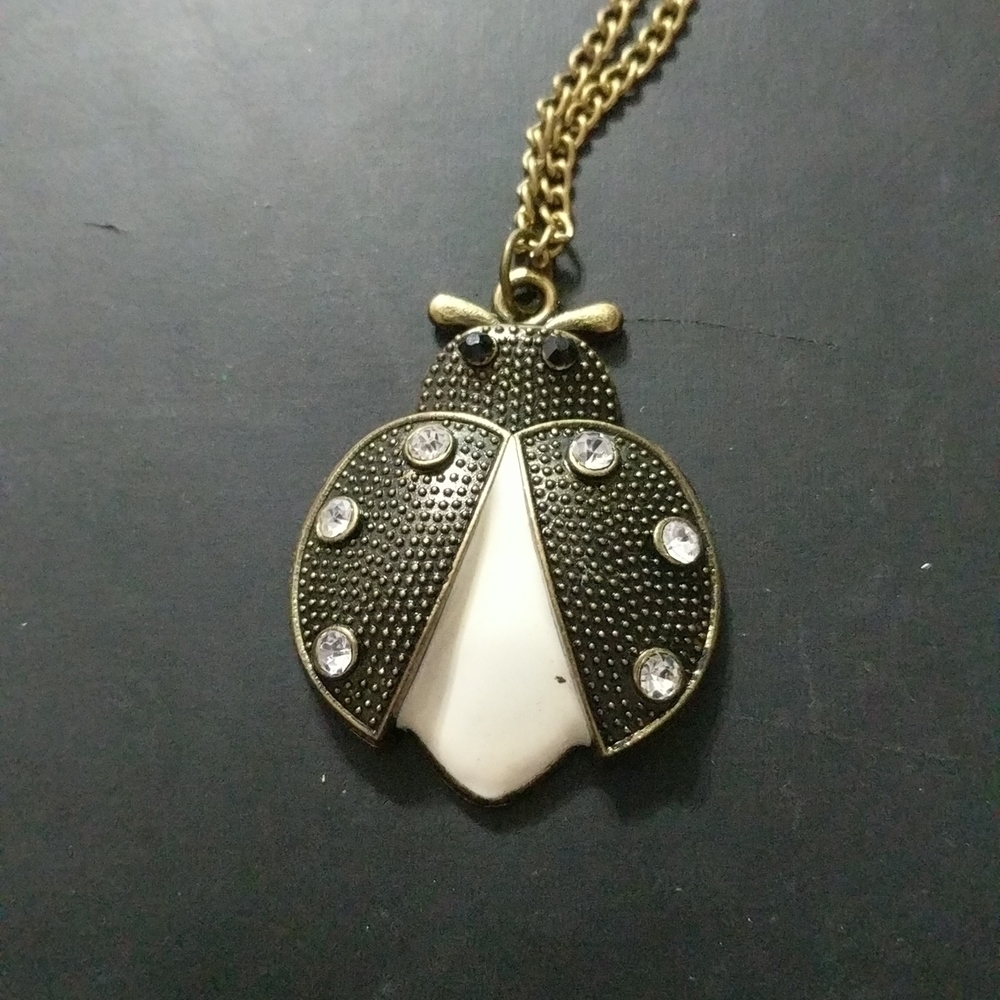 Gold Tone Clear Rhinestone Black and White Beetle Bug Pendant Necklace
